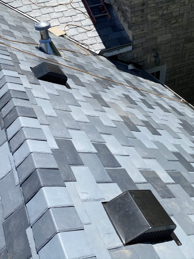 DaVinci synthetic slate roof with vents and ridge detail